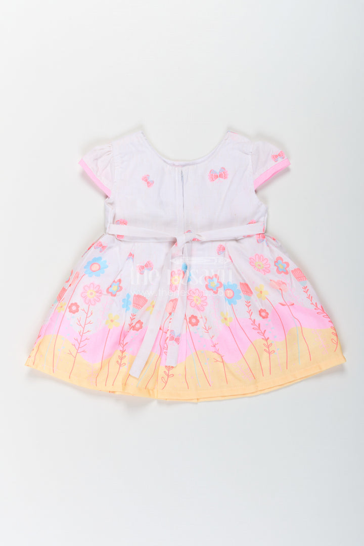 Girls Colorful Birthday Dress in Soft Cotton with Bright Floral Print and Pink Bow Accent