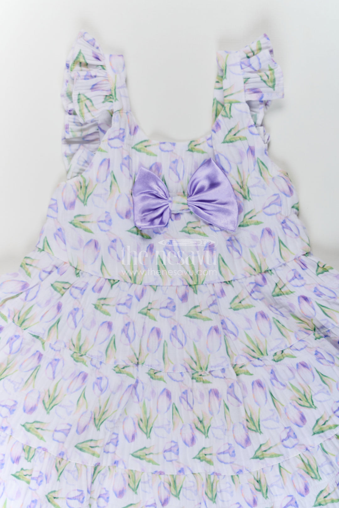 Girls Purple Floral Frocks with Sleeves in Chiffon Featuring Layered Ruffles and Bow Detail
