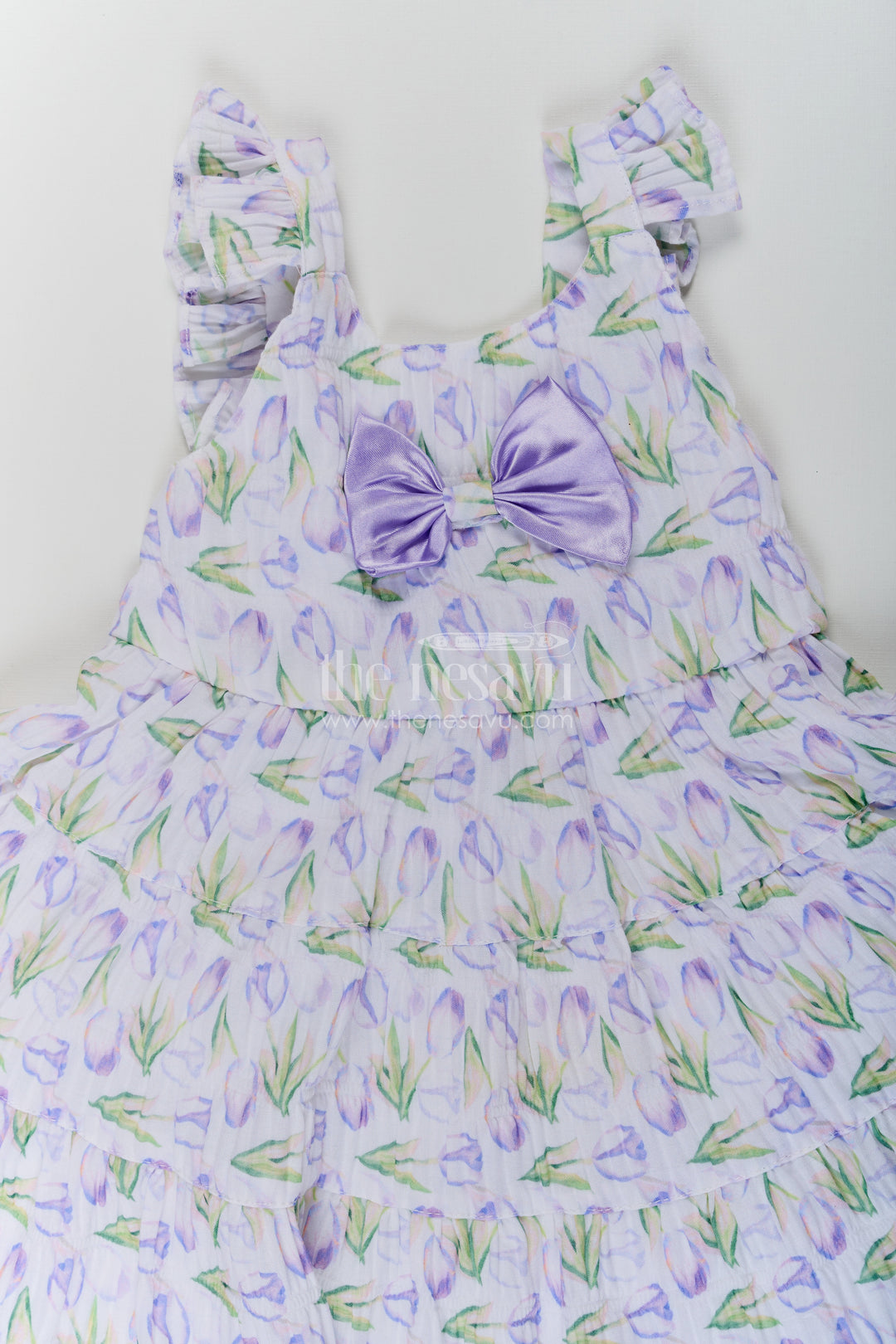 Girls Purple Floral Frocks with Sleeves in Chiffon Featuring Layered Ruffles and Bow Detail