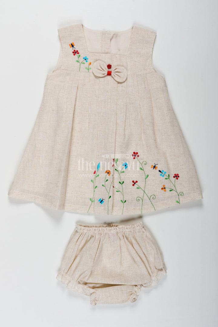 Baby Girls Bridal Frock Designs in Cream Flax Cotton with Colorful Floral Embroidery