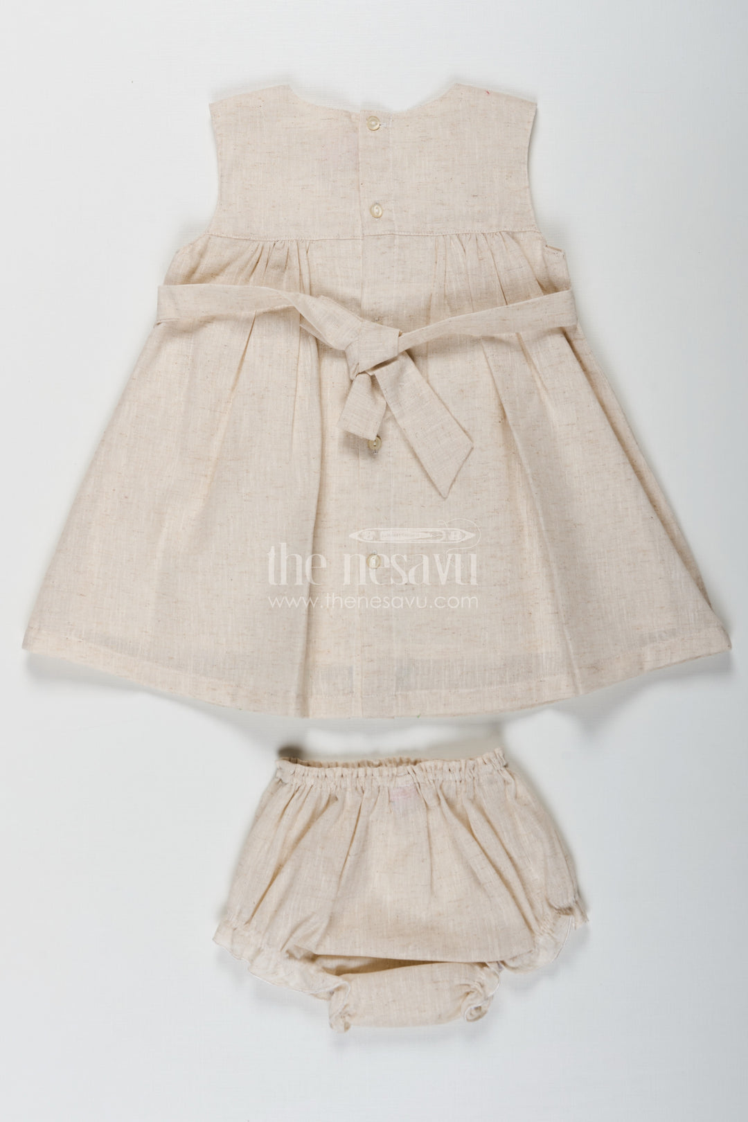 Baby Girls Bridal Frock Designs in Cream Flax Cotton with Colorful Floral Embroidery