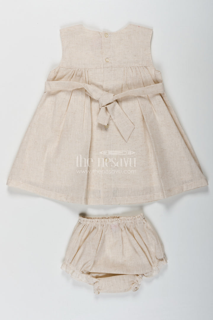 Baby Girls Bridal Frock Designs in Cream Flax Cotton with Colorful Floral Embroidery