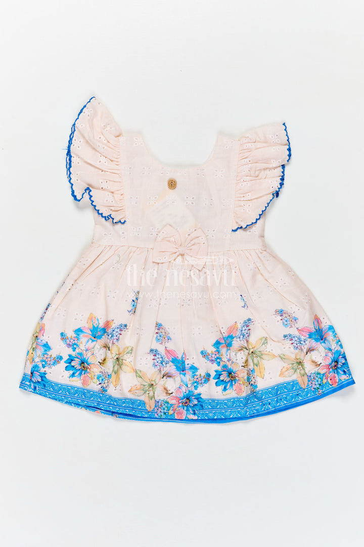 Infant Occasion Dress for Baby Girl in Cream Hakoba Cotton with Blue Floral Hem and Ruffled Sleeves