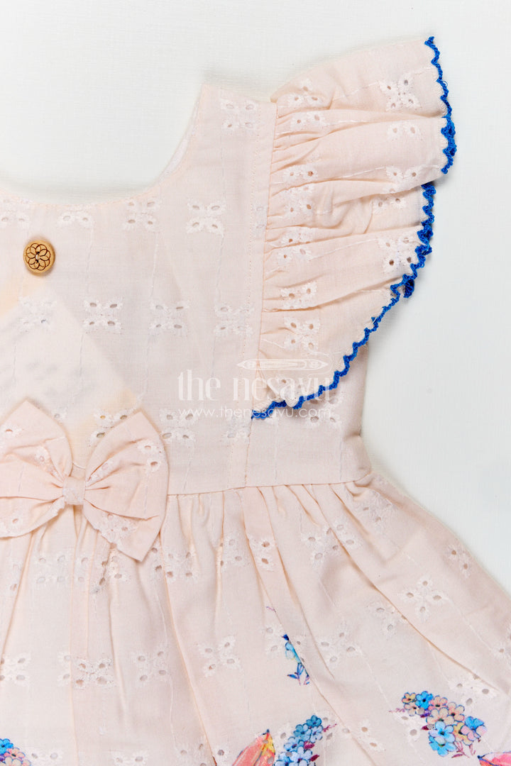 Infant Occasion Dress for Baby Girl in Cream Hakoba Cotton with Blue Floral Hem and Ruffled Sleeves