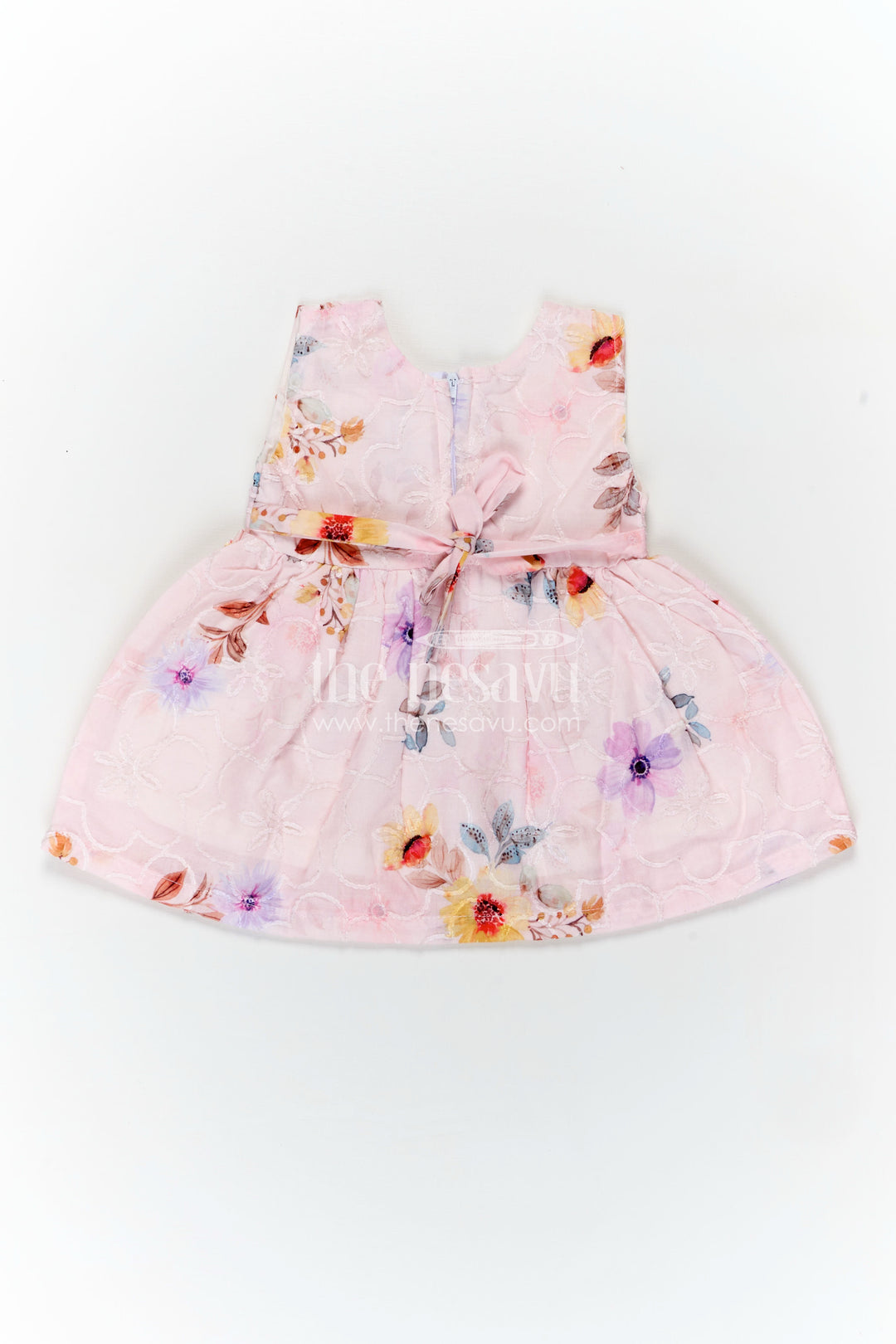Peach Birthday Frock for Baby Girls in Embroidered Cotton with Pastel Floral Print and Bow