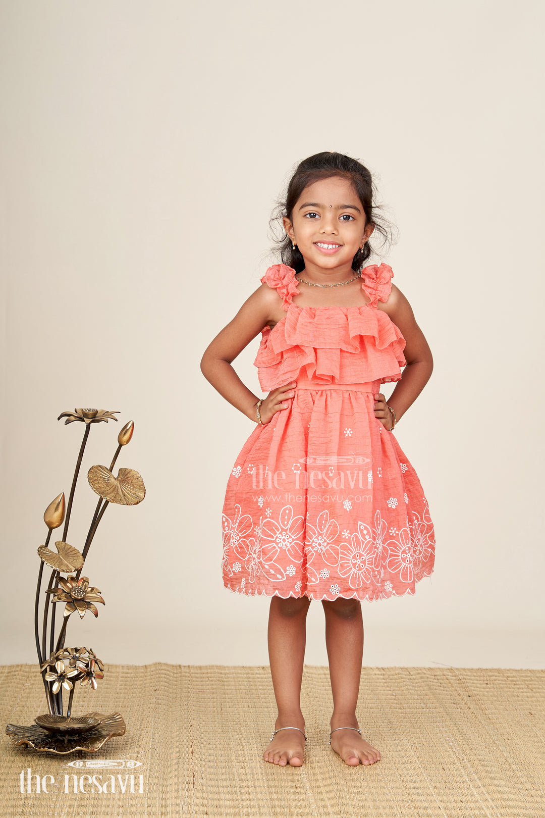 Traditional pink frock for baby girls for wedding functions with cotton fabric and floral accents