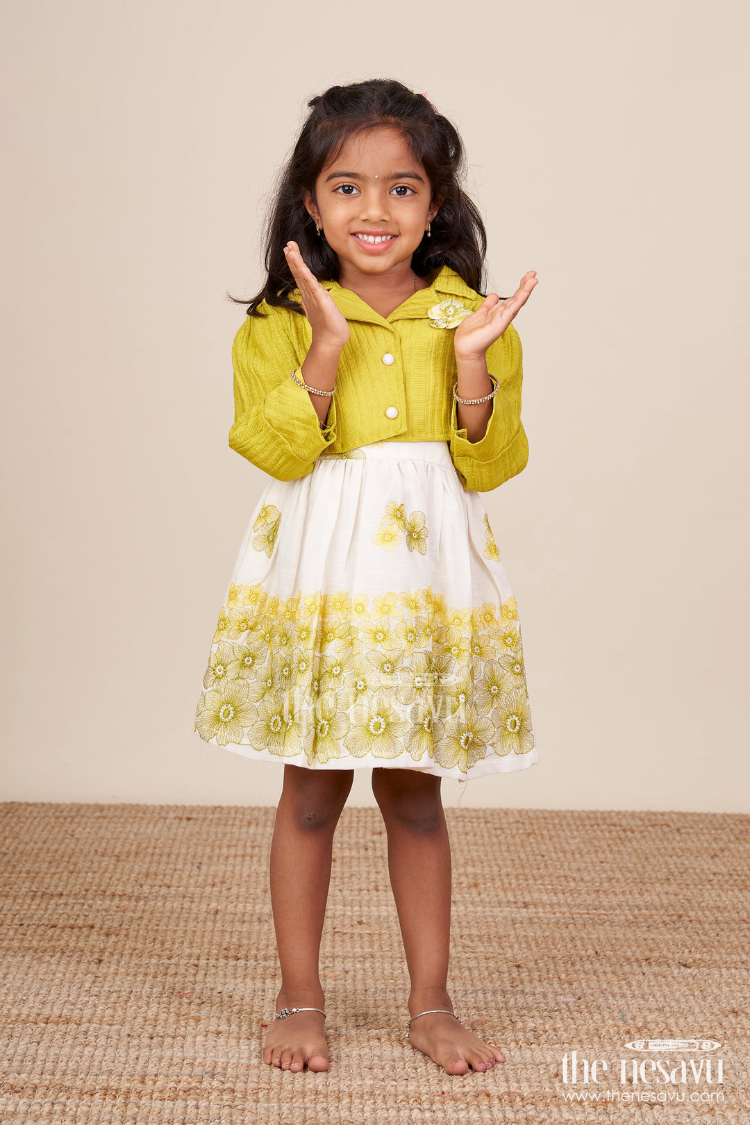 Hand-embroidered cotton frock for baby girls with soft pastel finish