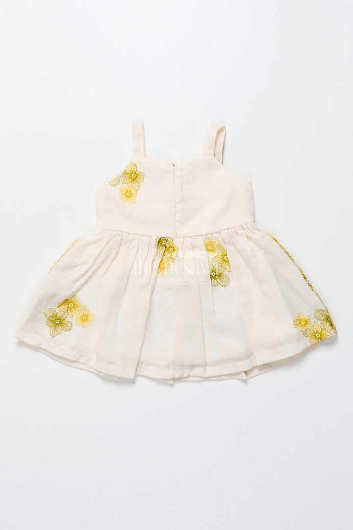 Hand-embroidered cotton frock for baby girls with soft pastel finish