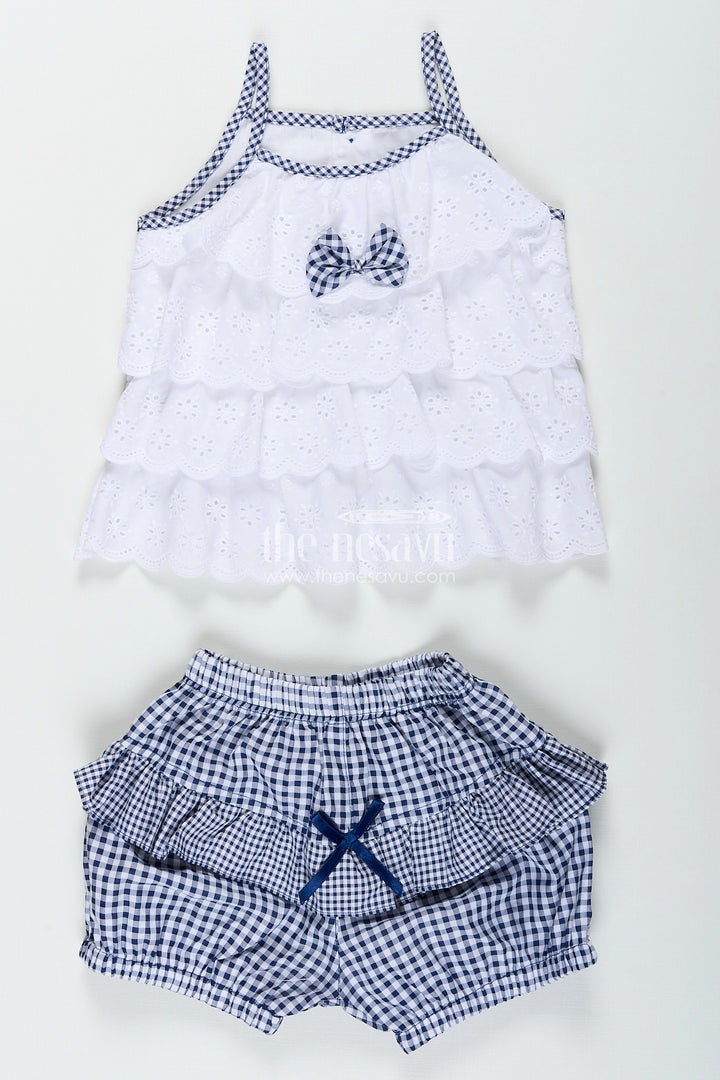 Baby girl frock with navy gingham shorts and bow detailing
