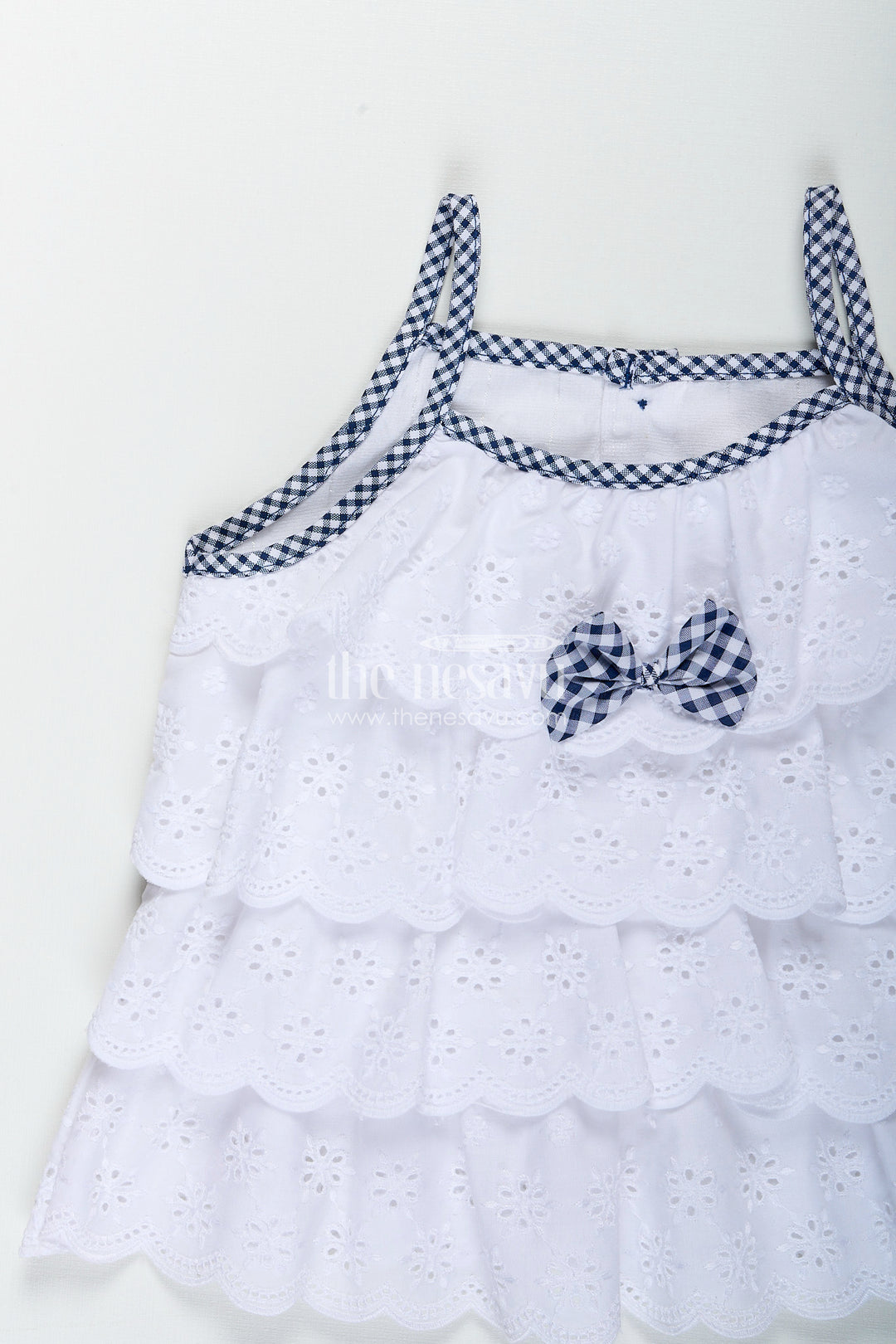 Baby girl frock with navy gingham shorts and bow detailing