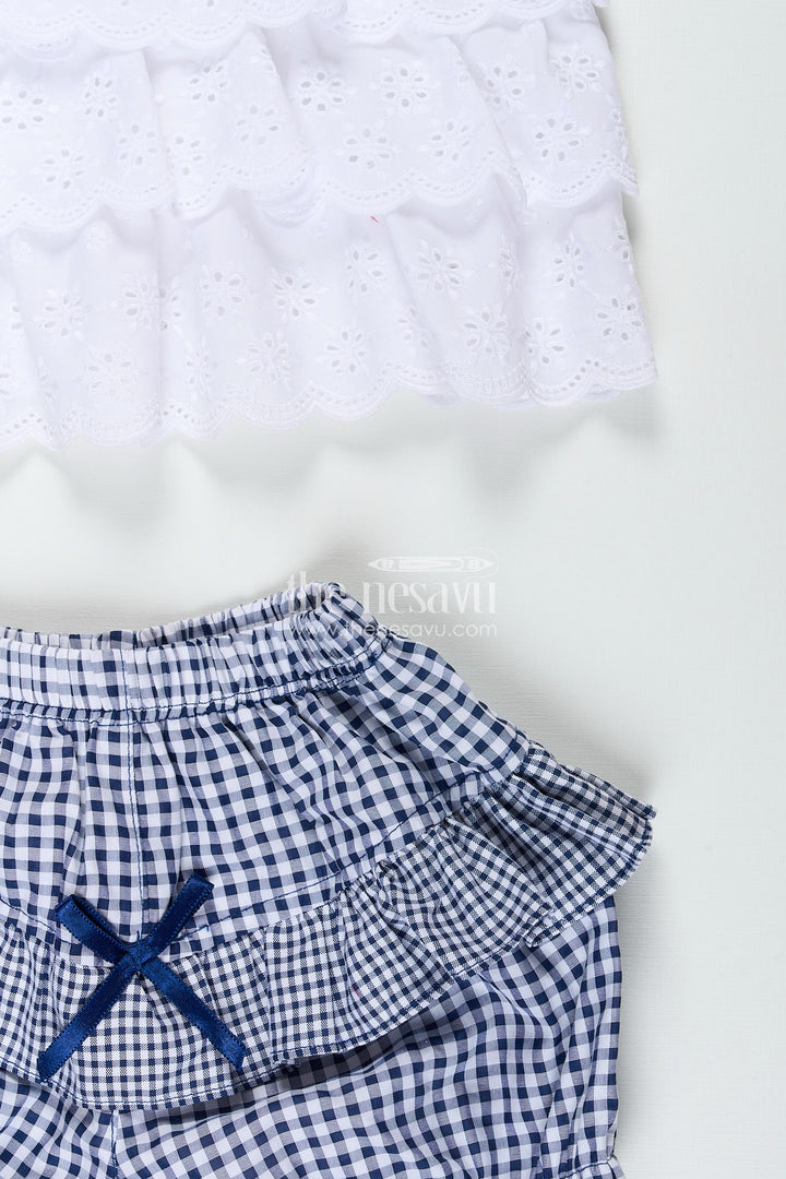 Baby girl frock with navy gingham shorts and bow detailing