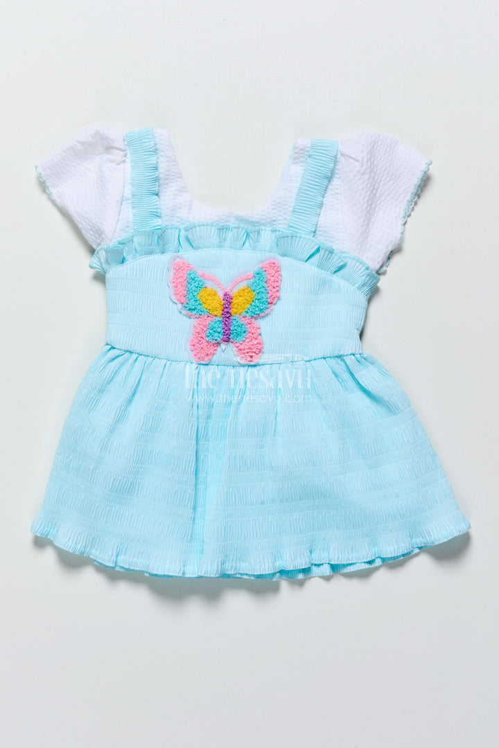 Baby frock in seersucker cotton with multicolor butterfly patch Pink