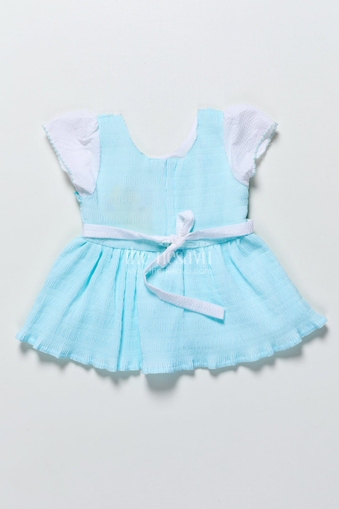Baby frock in seersucker cotton with multicolor butterfly patch Pink