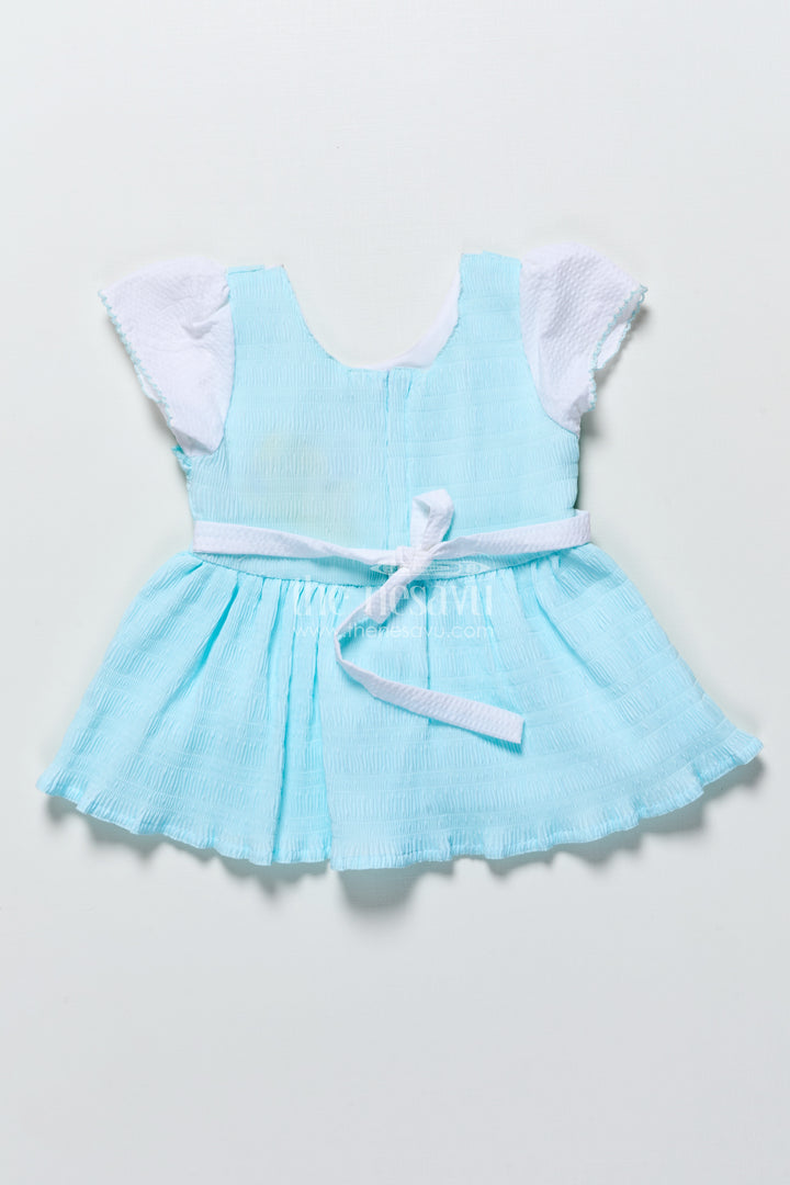 Baby frock in seersucker cotton with multicolor butterfly patch Pink
