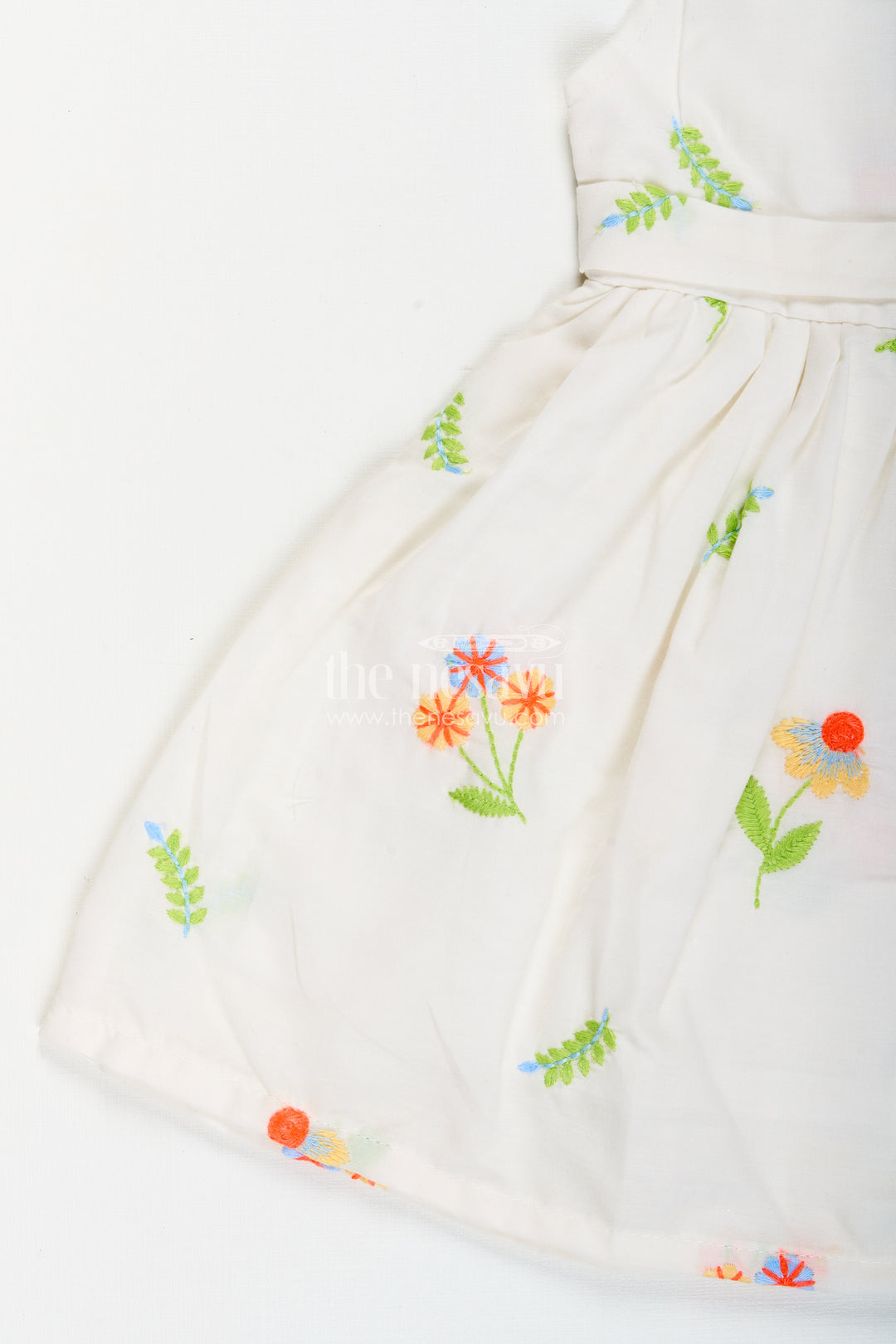 Nesavu cotton baby girl frock with pastel floral embroidery and peter pan collar