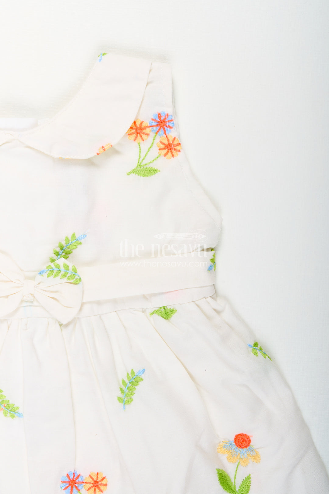 Nesavu cotton baby girl frock with pastel floral embroidery and peter pan collar