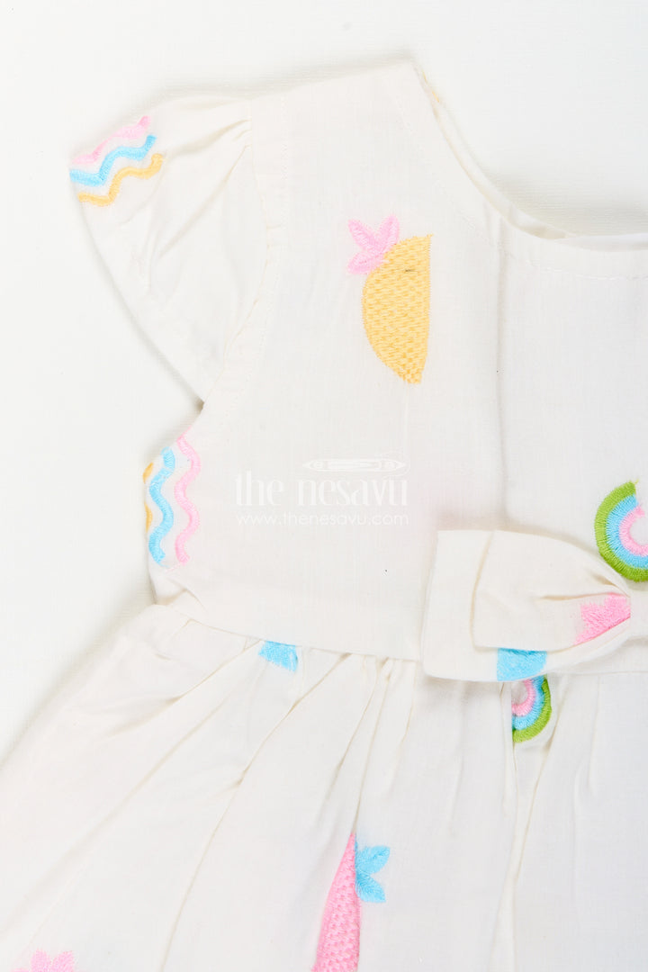 White baby girl frock with pastel embroidery for everyday wear