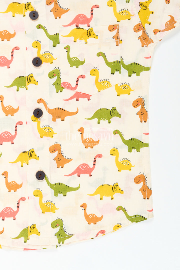 Boys dinosaur print shirt in earthy tones for birthday parties