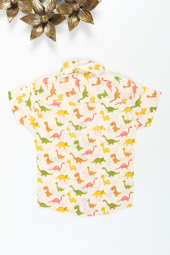 Boys dinosaur print shirt in earthy tones for birthday parties
