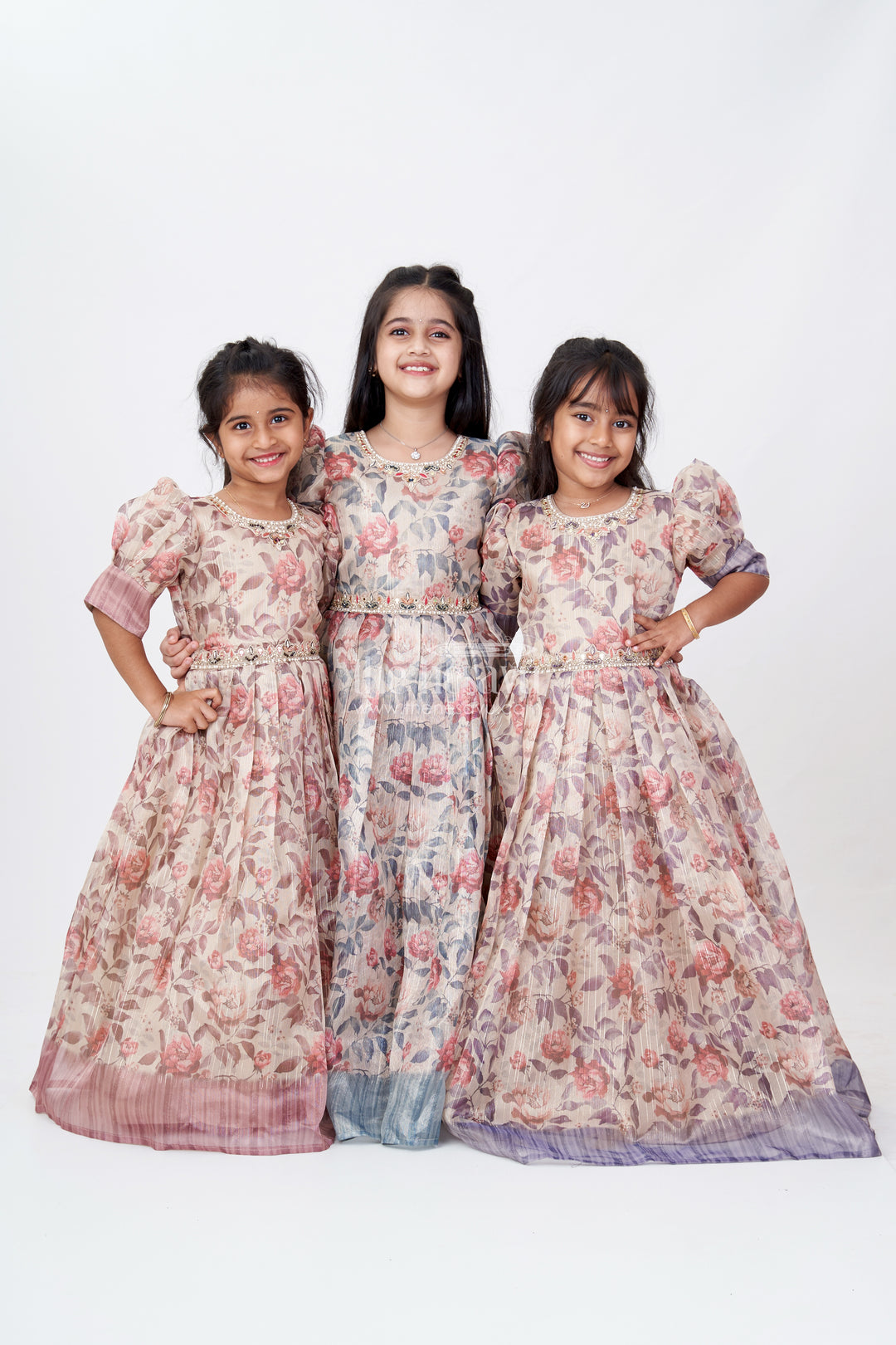 Girls Party Gowns in Gold Tissue Fabric with Floral Digital Print and Puff Sleeves for Stylish Occasions