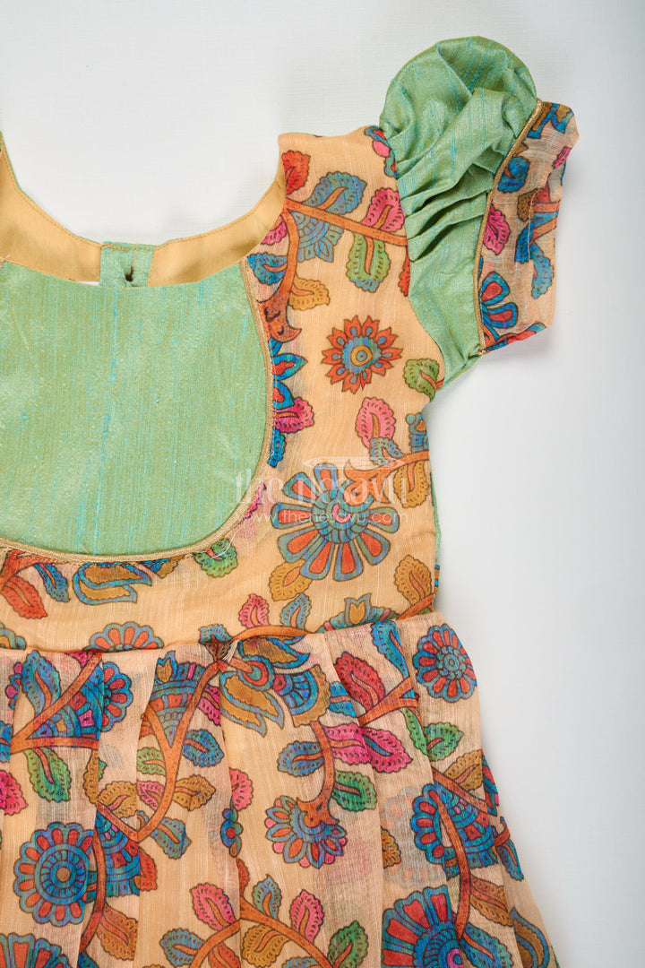 Yellow Gown Dress for Girls with Embroidered Floral Motifs and Raw Silk Yoke in Chanderi Cotton Blend