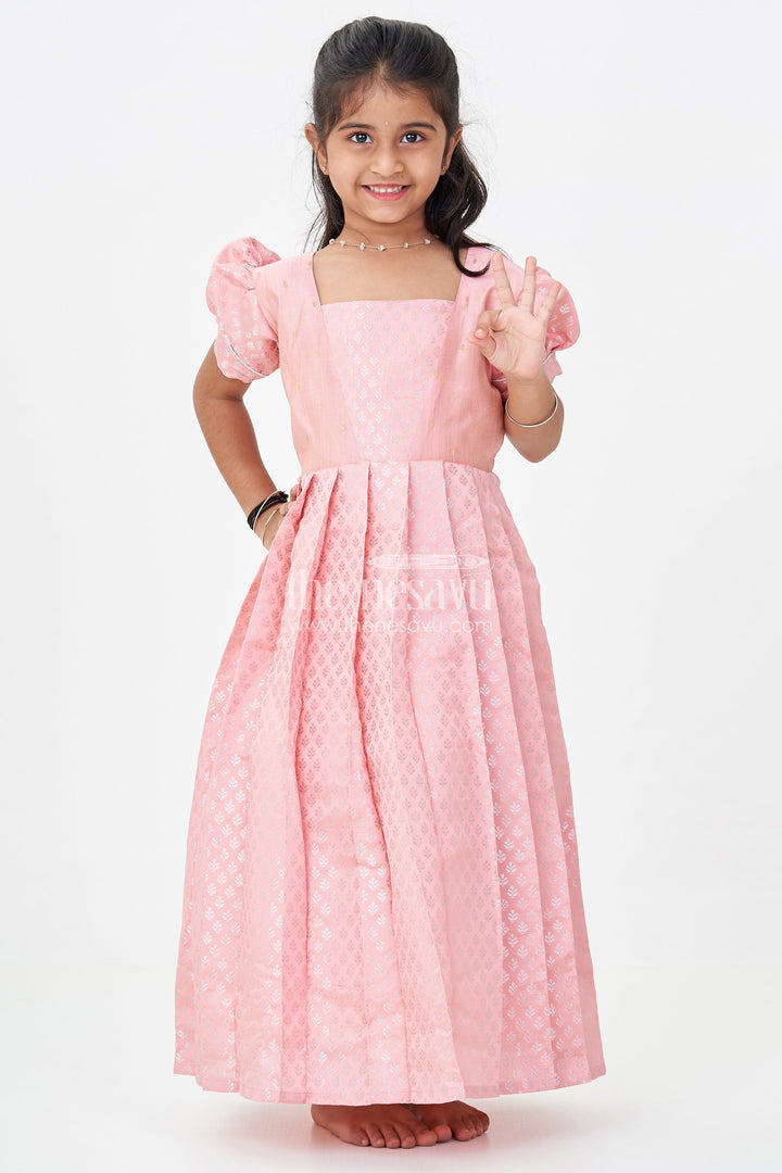 Girls Semi Banaras Silk Pink Party Wear Gown with Intricate Woven Motifs and Classic Puff Sleeves