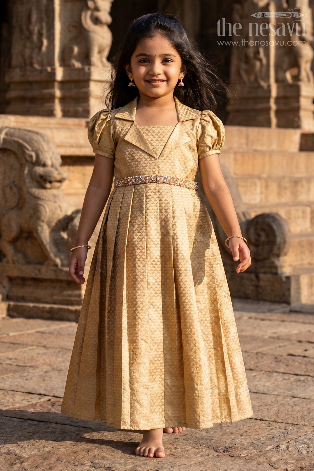 Nesavu girls golden tissue silk anarkali with puff sleeves and bead-embellished waist belt The Nesavu Nesavu girls golden tissue silk anarkali with puff sleeves and bead-embellished waist belt The Nesavu