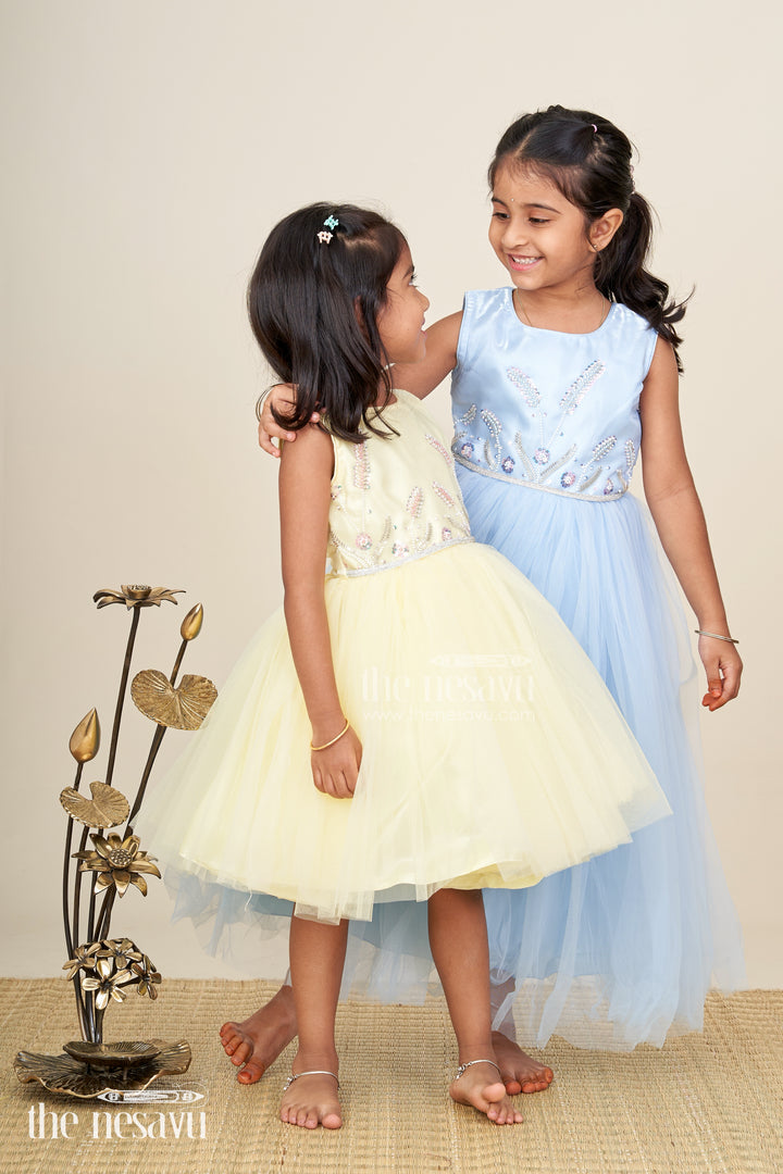 Satin party gown for girls with embroidered yoke and layered net skirt