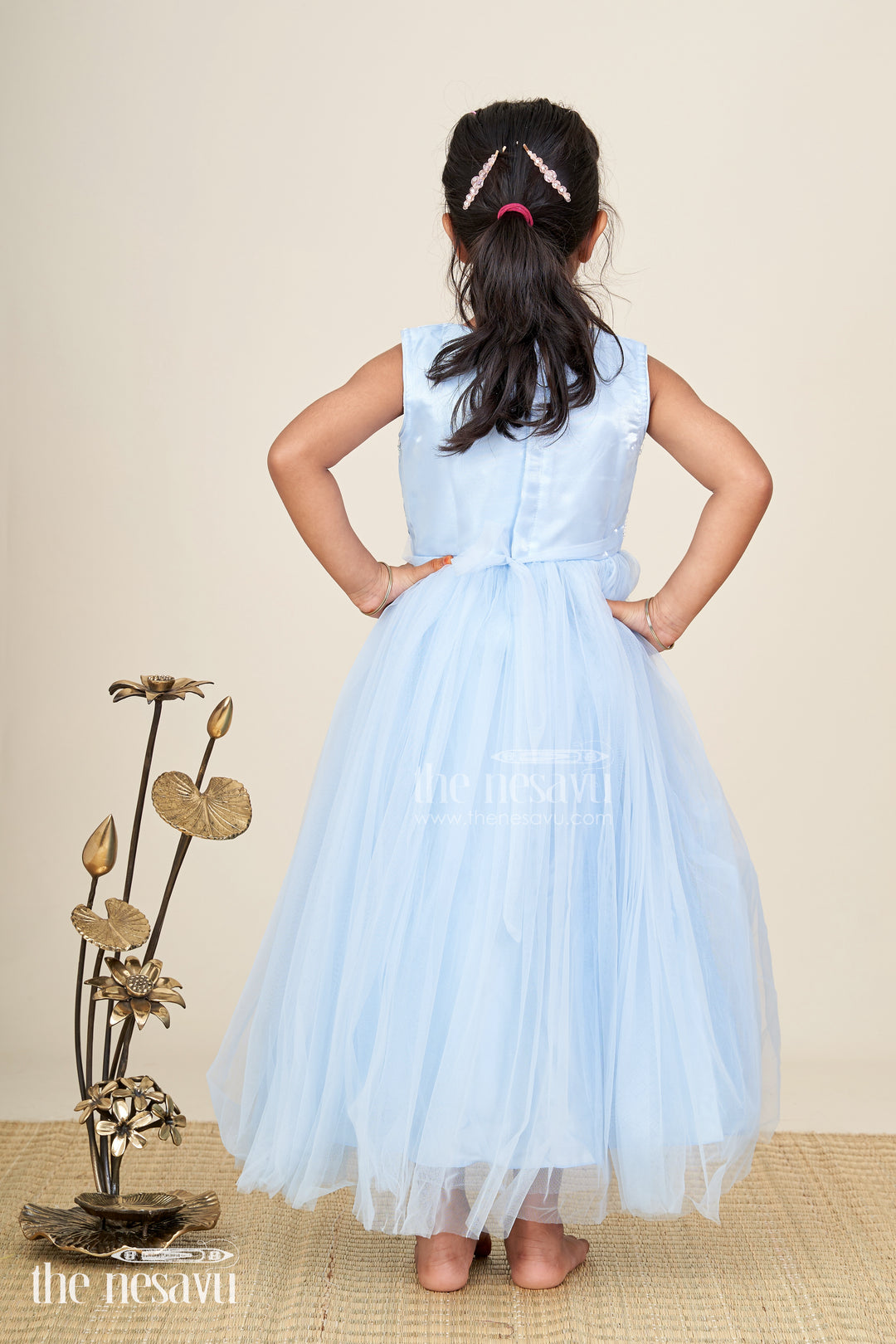 Satin party gown for girls with embroidered yoke and layered net skirt