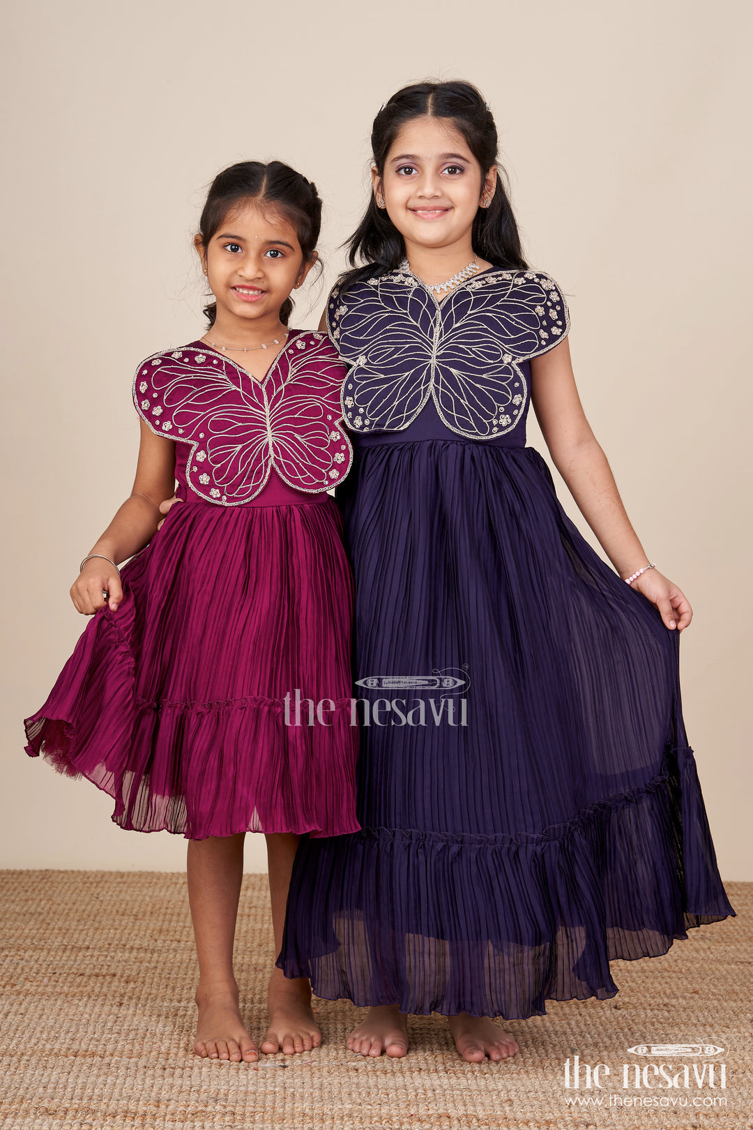 Girls purple party gown with butterfly embellished bodice