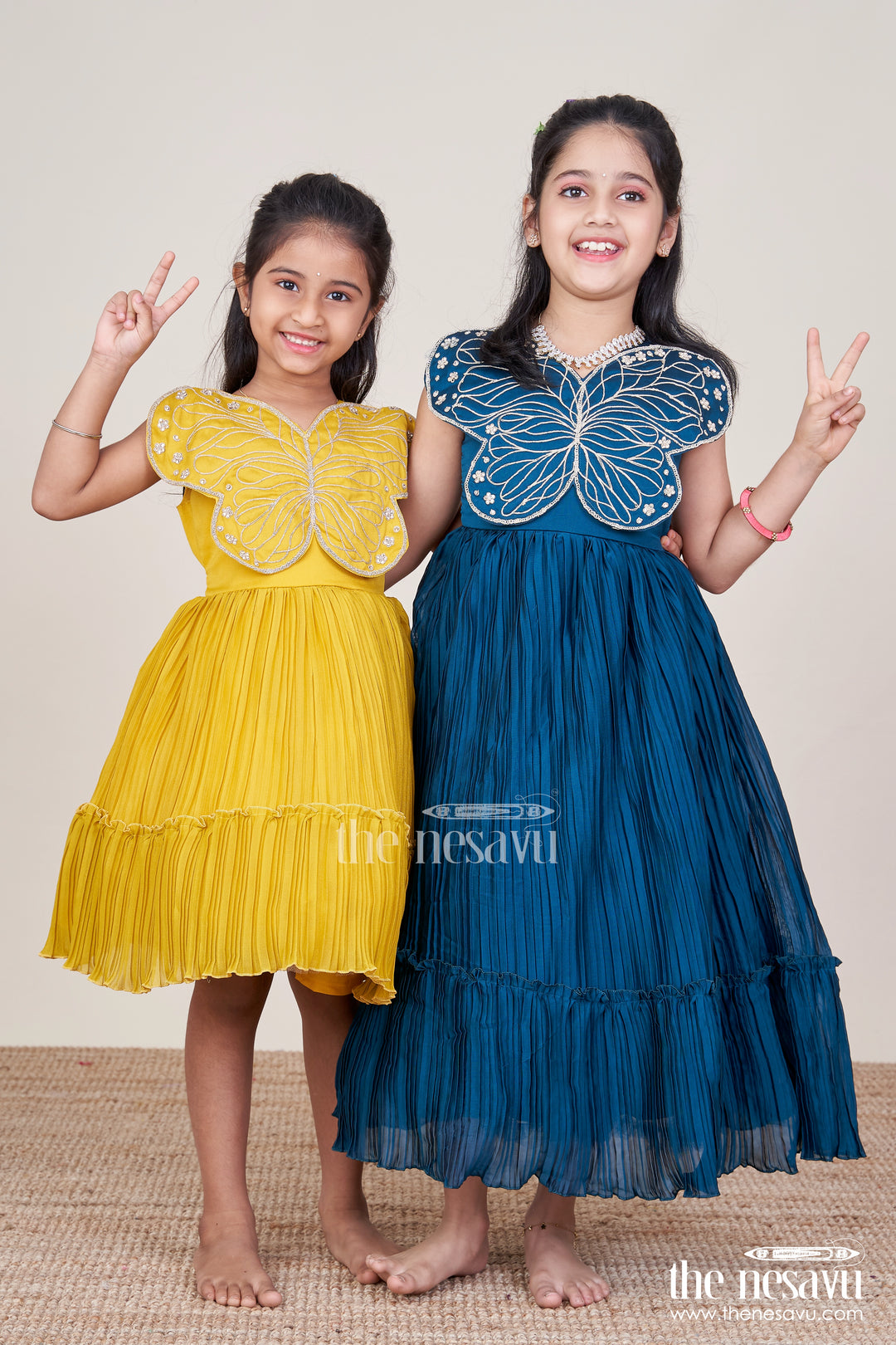 Party Gown for Girls with Butterfly Embellishment and Pleated Skirt