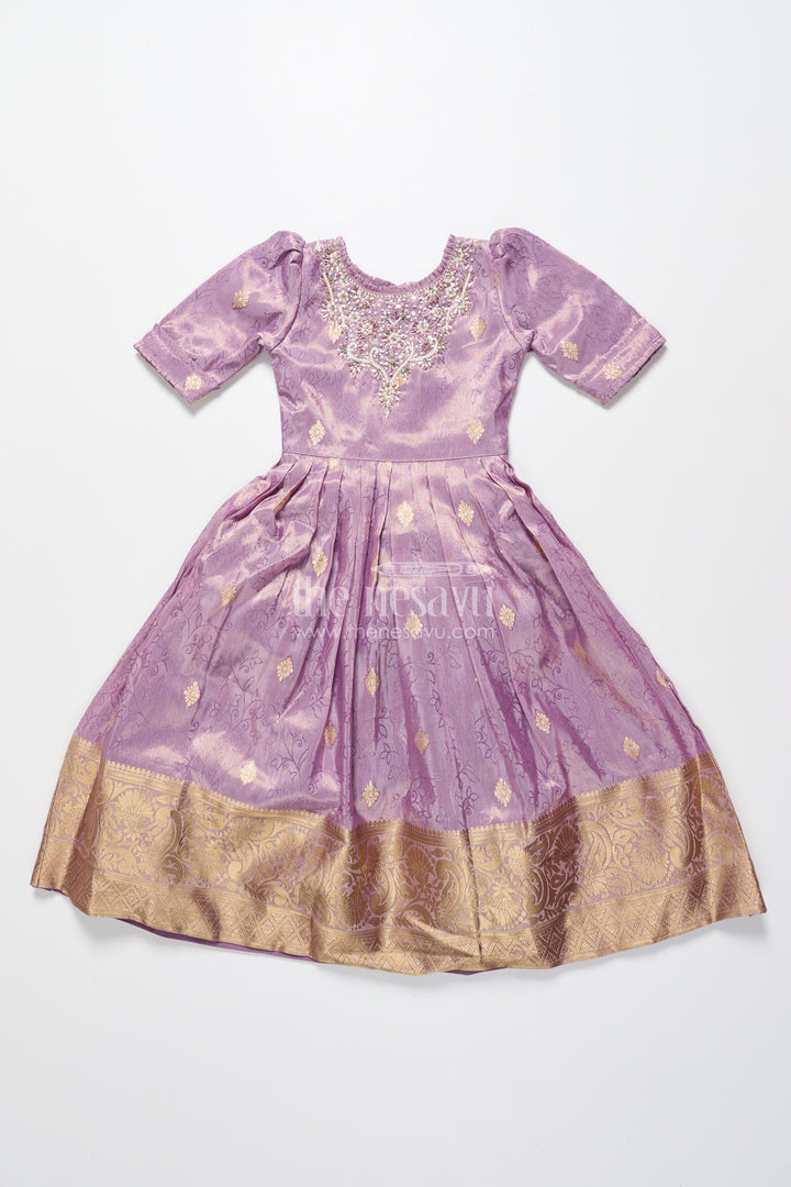 Girls festive silk gown with zari border for grand celebrations