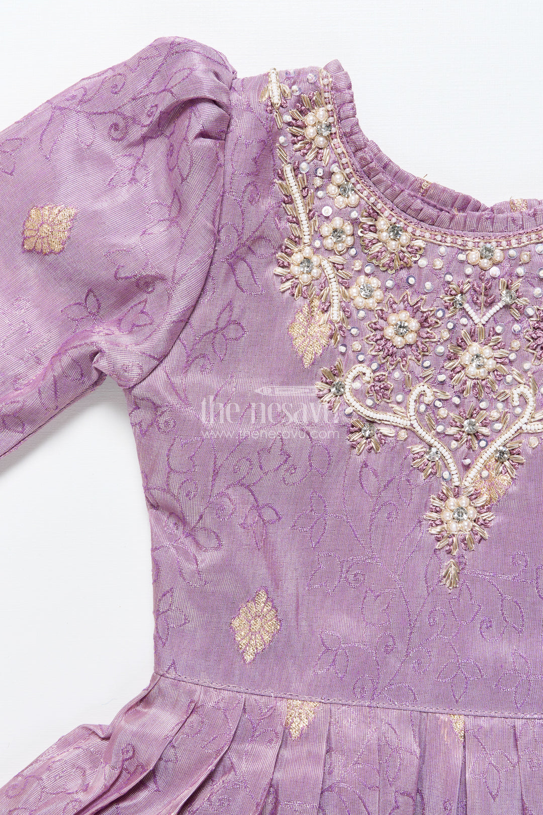 Girls festive silk gown with zari border for grand celebrations