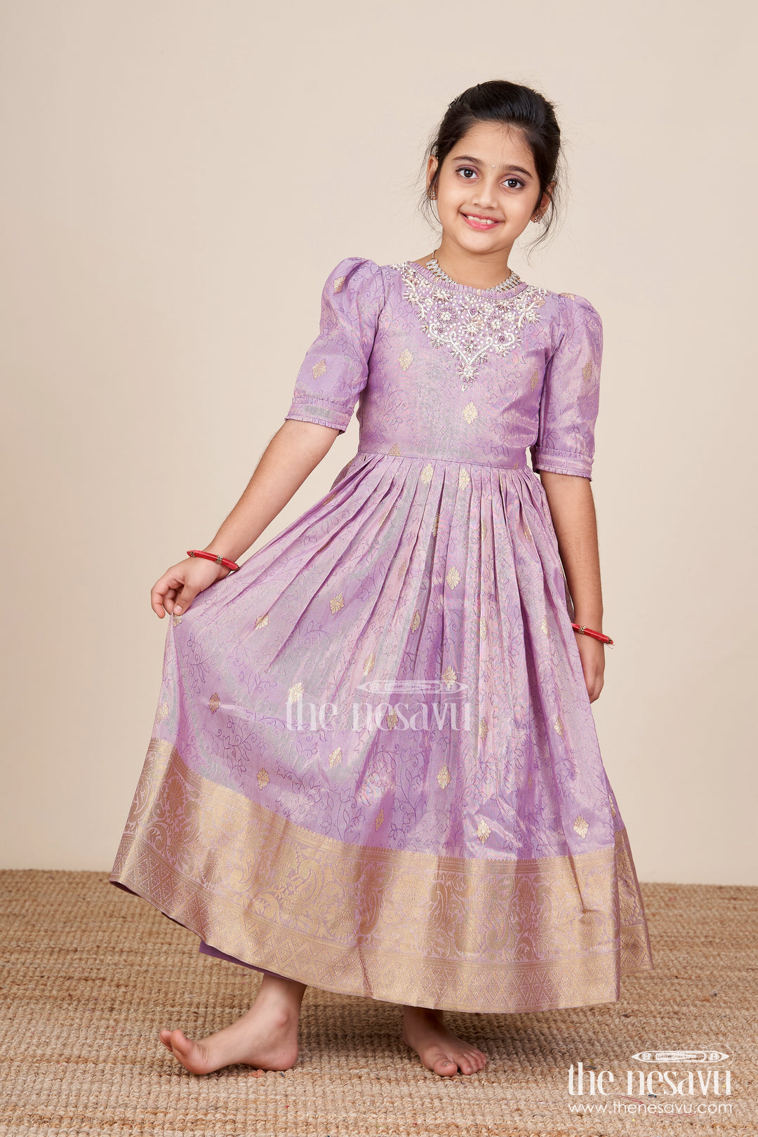 Girls festive silk gown with zari border for grand celebrations