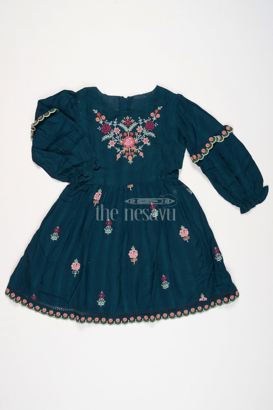 Girls Green Cotton Frock with Embroidered Bodice and Puff Sleeves in Charming frock fancy design