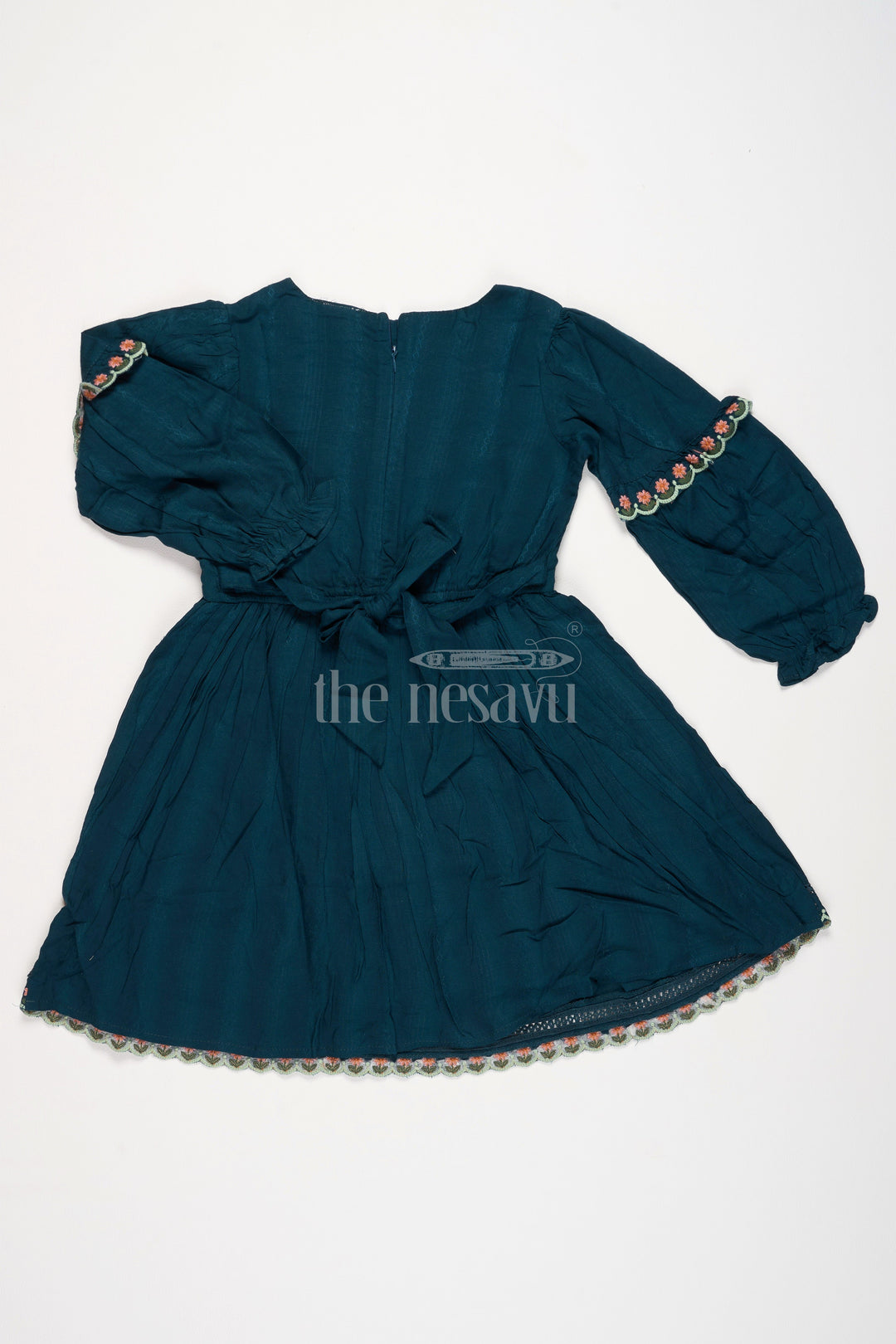 Girls Green Cotton Frock with Embroidered Bodice and Puff Sleeves in Charming frock fancy design