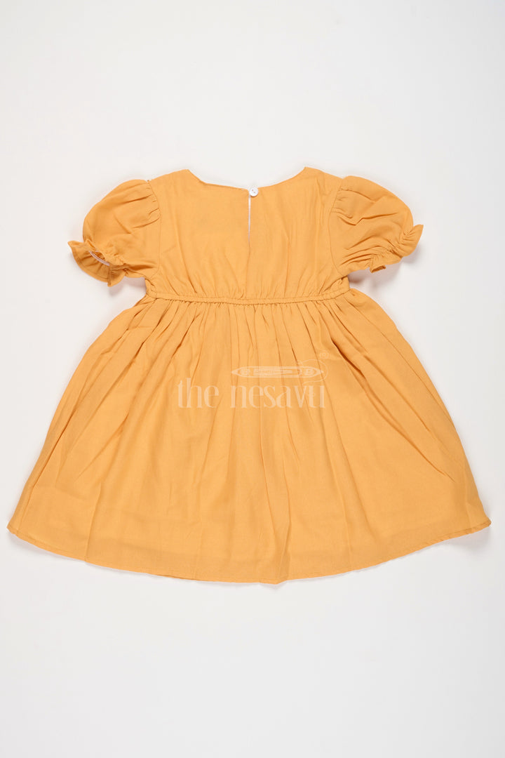 Girls Mustard Cotton Frock with Embroidered Yoke and Puff Sleeves in Simple frock design cotton Look