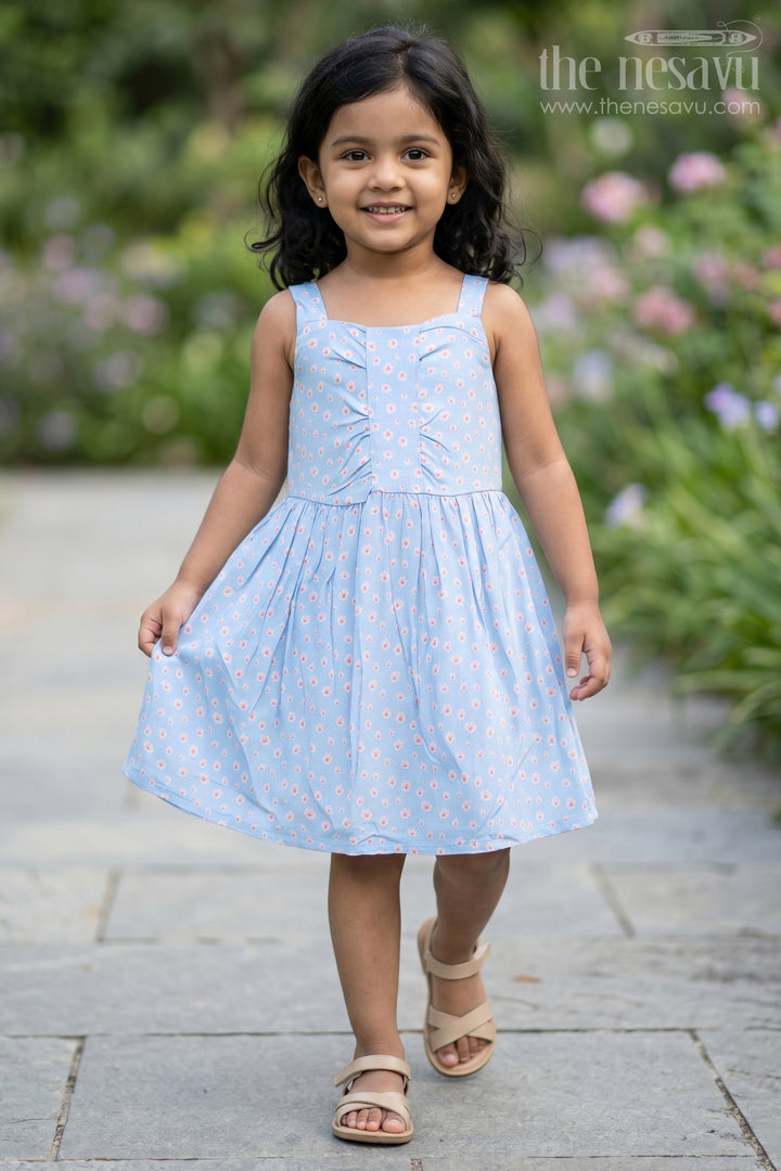 Girls Cotton Frock Online with Dainty Floral Prints in Light Blue Muslin Fabric