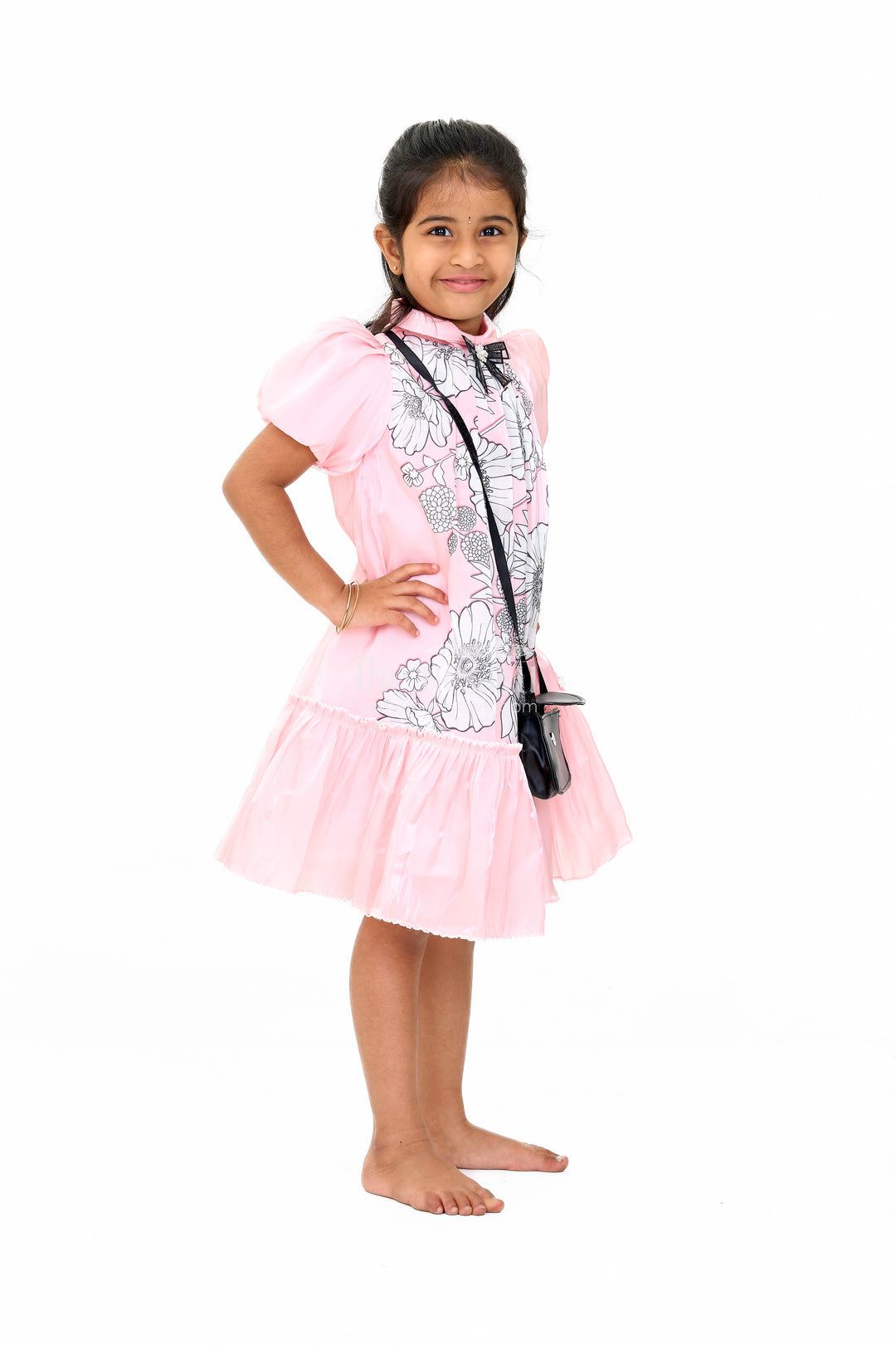 Elegant Girls Fancy Frock in Pink Georgette Fabric with Floral Print and Ruffled Hemline