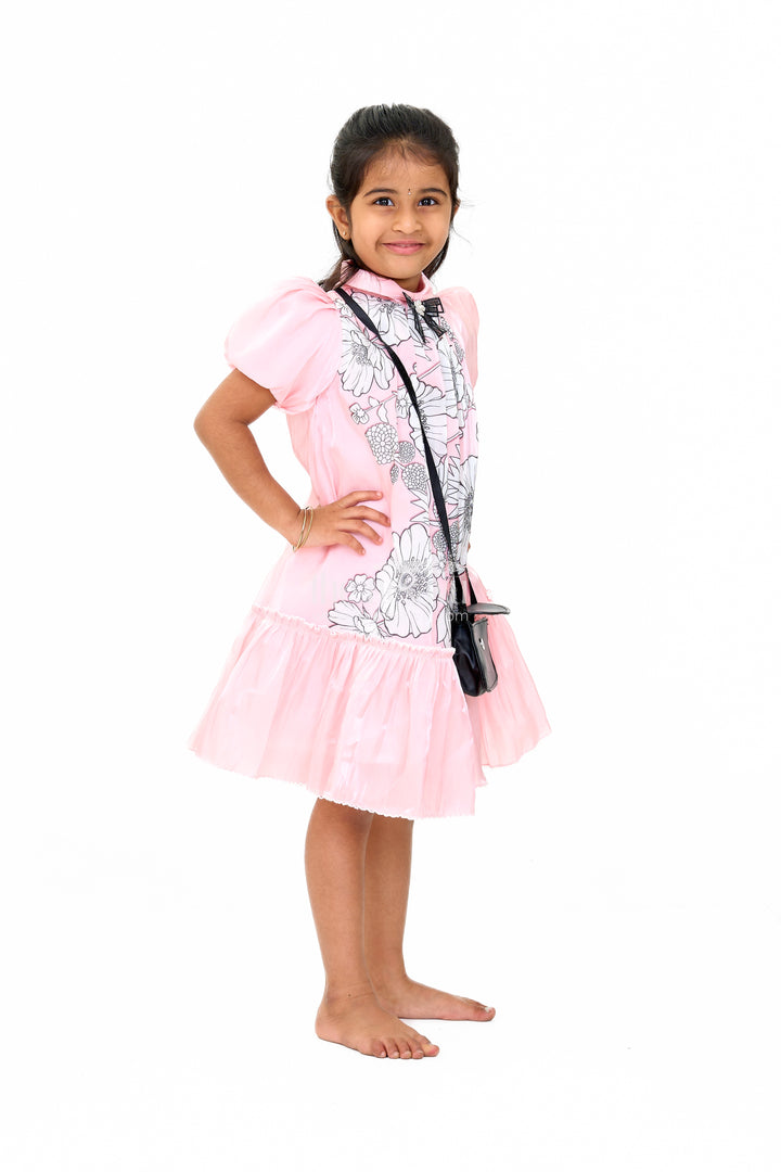 Elegant Girls Fancy Frock in Pink Georgette Fabric with Floral Print and Ruffled Hemline