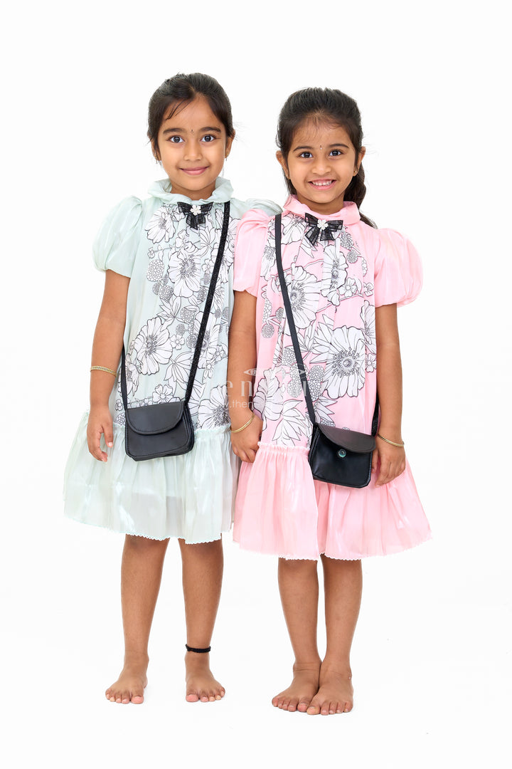 Elegant Girls Fancy Frock in Pink Georgette Fabric with Floral Print and Ruffled Hemline