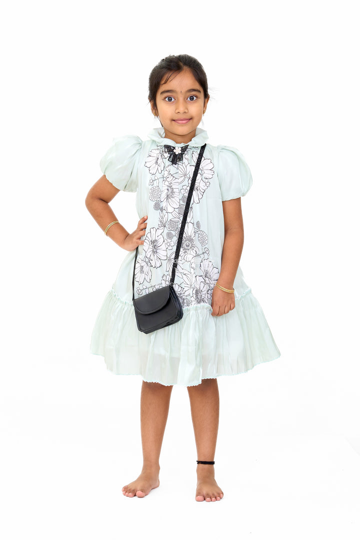 Graceful Girls Fancy Frock in Green Georgette with Floral Prints and Pleated Hem
