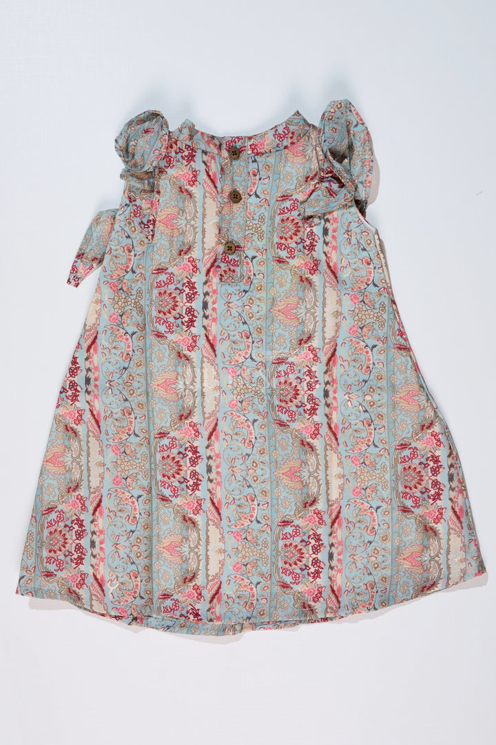 Girls Latest Frock in Muslin Silk with Intricate Print and Decorative Bow