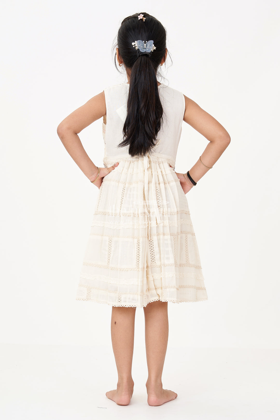 Girls White Color Frock with Embroidery and Layered Pleats for Graceful Festive Wear