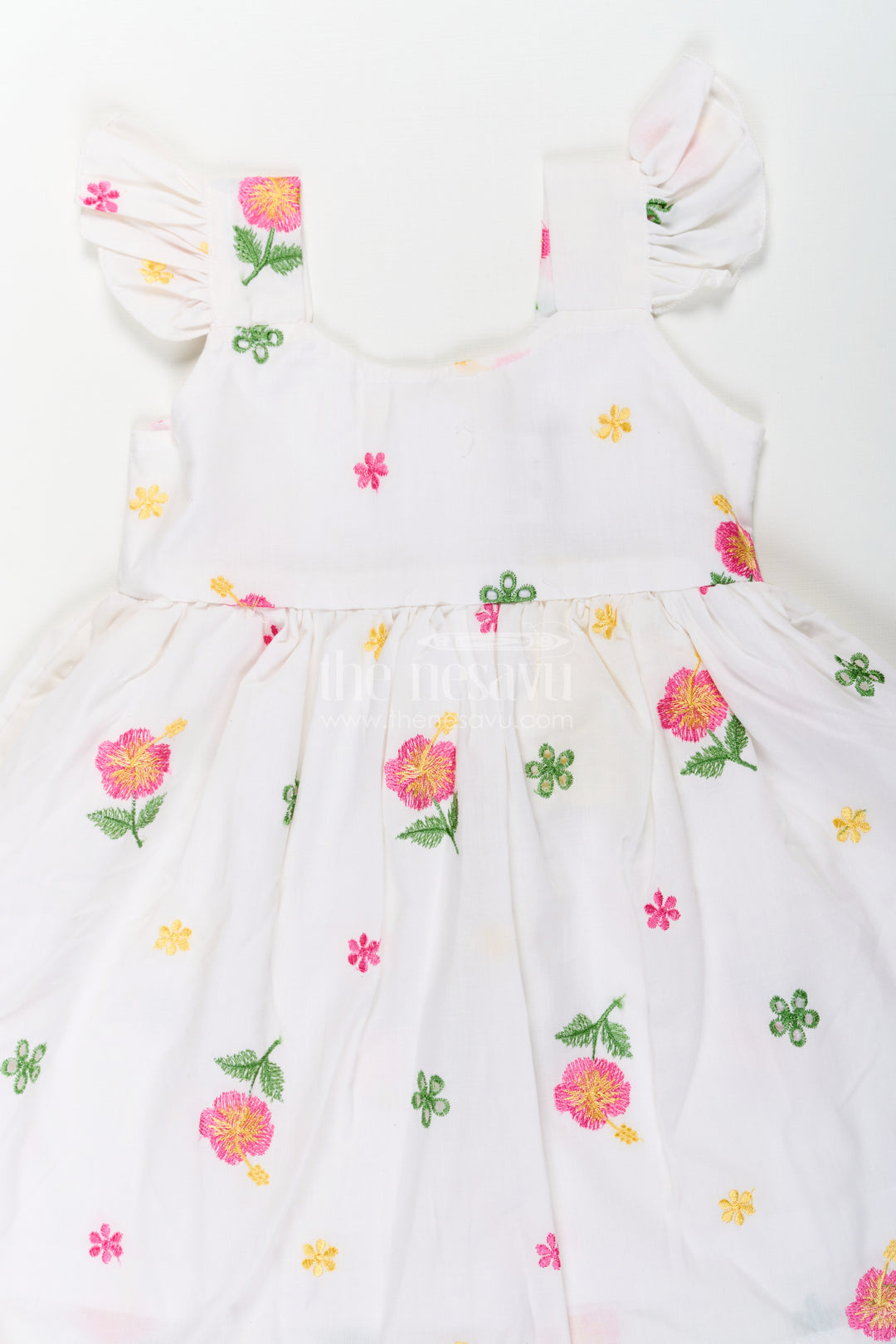 Girls White Short Frock in Cotton Embroidery with Floral Patterns and Ruffled Sleeves