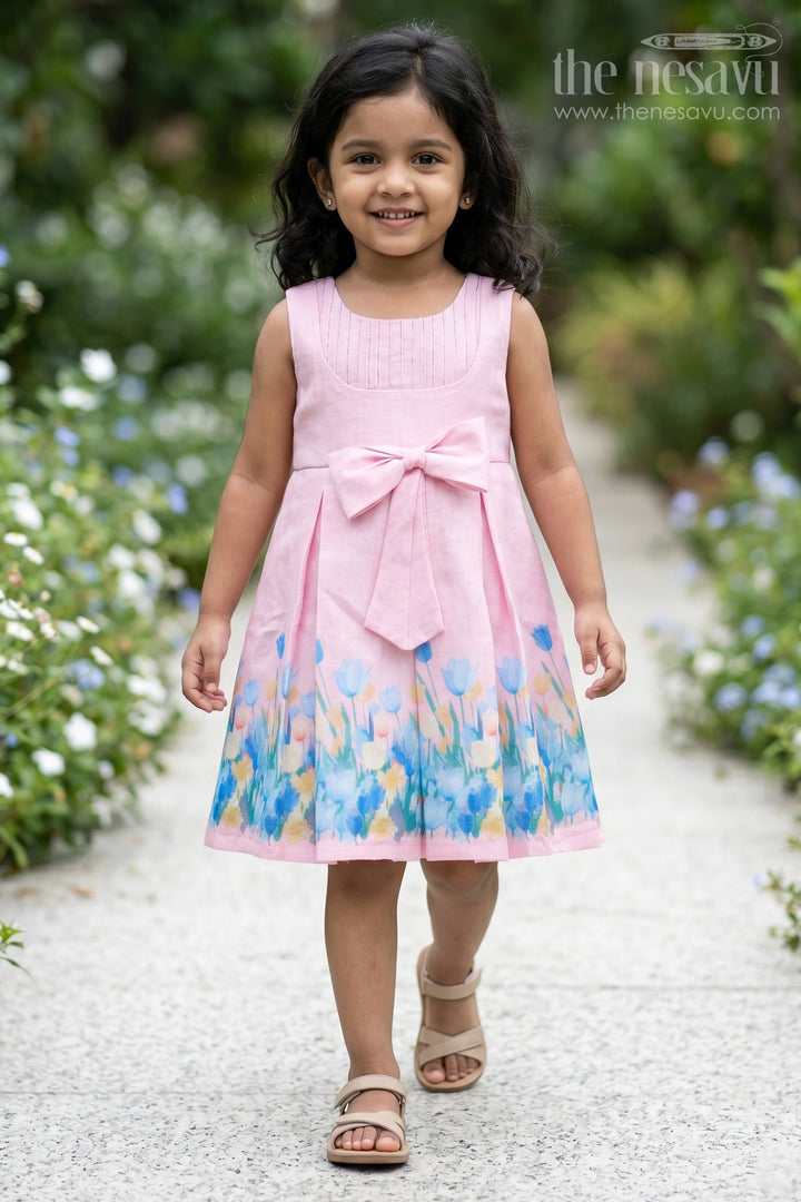 Girls Pink Colour Frock in Cotton Printed Fabric with Floral Border and Elegant Bow