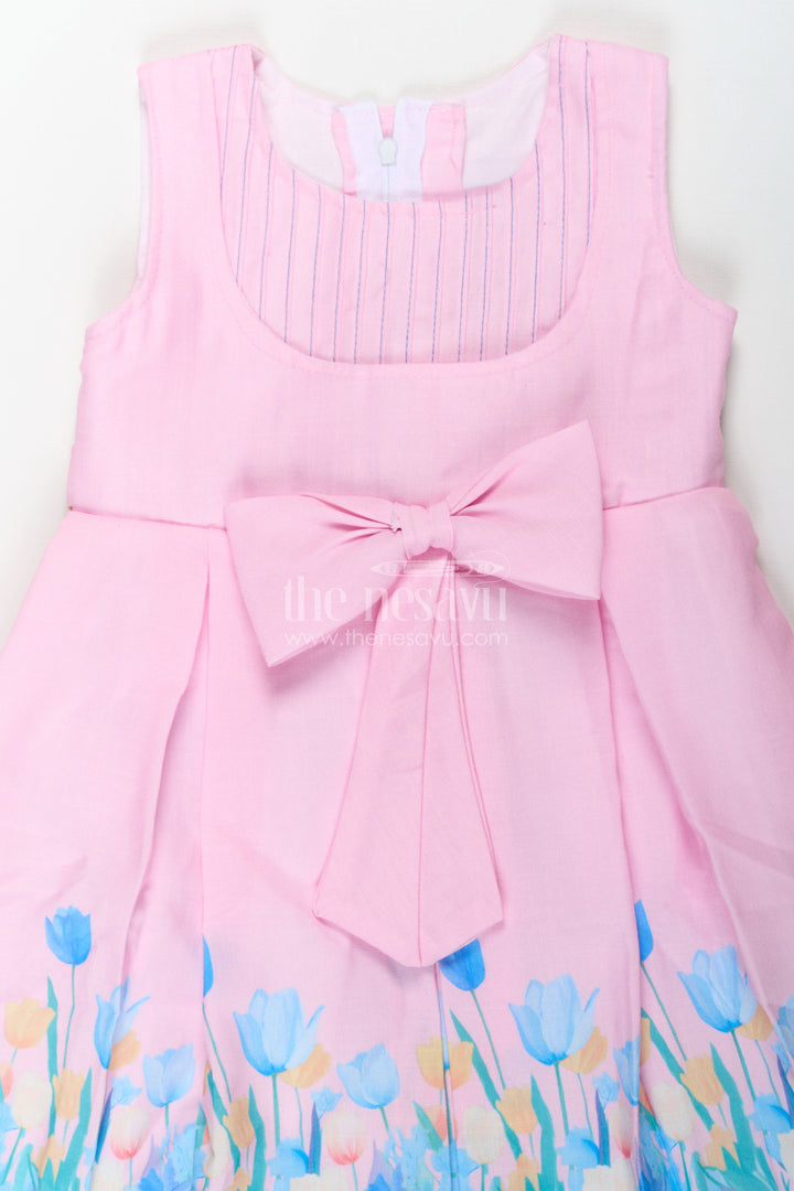 Girls Pink Colour Frock in Cotton Printed Fabric with Floral Border and Elegant Bow