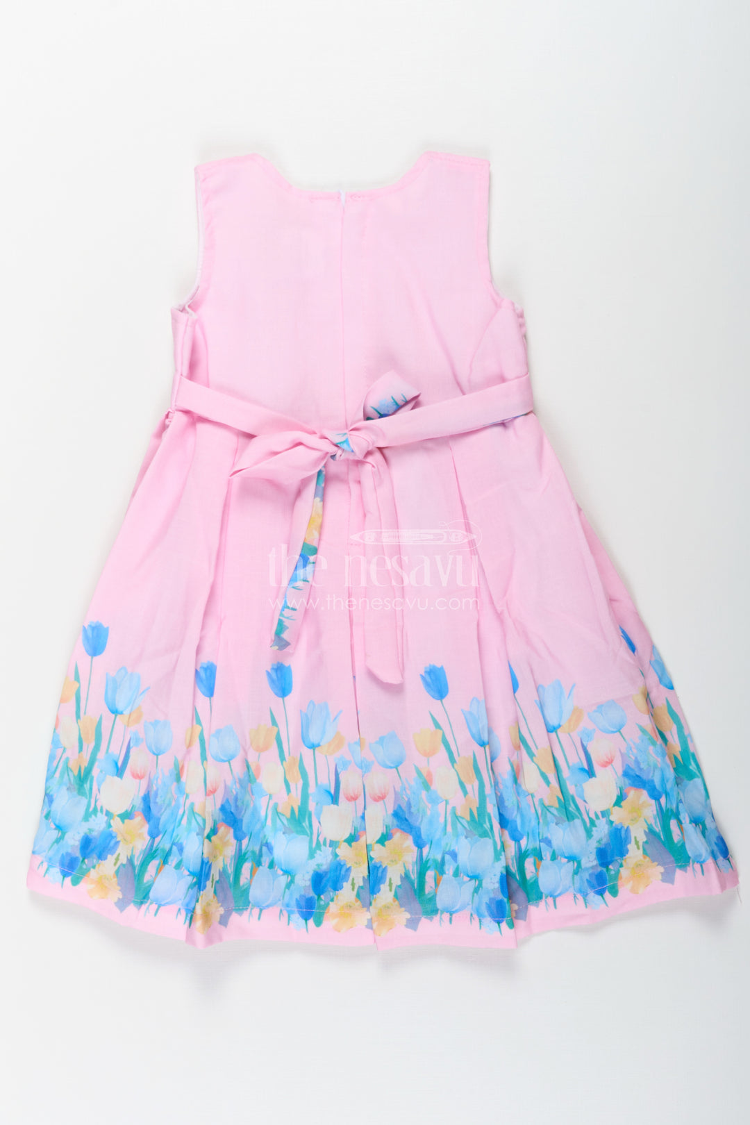 Girls Pink Colour Frock in Cotton Printed Fabric with Floral Border and Elegant Bow
