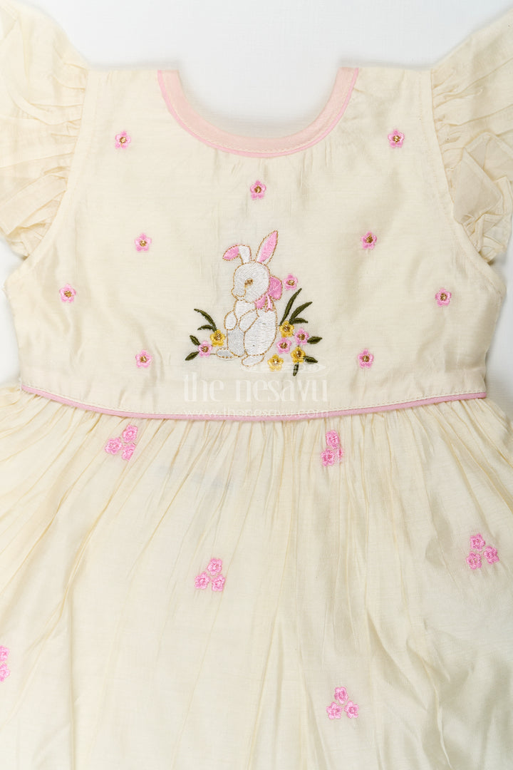 Girls Animal Print Ruffle Dress in Chanderi with Thread Embroidery and Pink Floral Accents