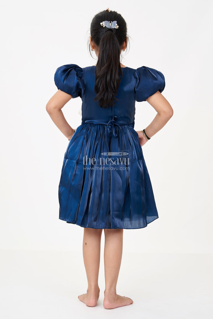 Girls Disney Princess Frock in Navy Blue Satin with Puff Sleeves and Large Ivory Bow Embellishment